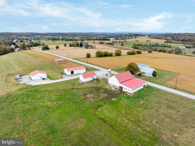 a view of a street with an ocean view
