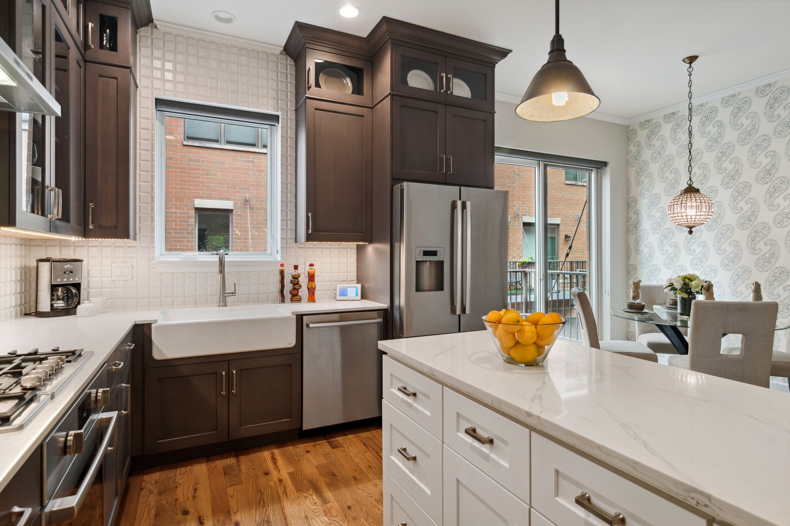 1648 South Prairie Avenue, Unit 4 Chicago, IL 60616 - Photo 11 of 30 a kitchen with stainless steel appliances a sink a stove and refrigerator