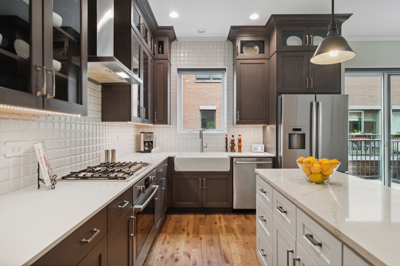 1648 South Prairie Avenue, Unit 4 Chicago, IL 60616 - Photo 10 of 30 a kitchen with stainless steel appliances a sink stove and refrigerator