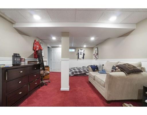 18 Community Road Billerica, MA 01821 - Photo 14 of 22 a living room with furniture and a flat screen tv