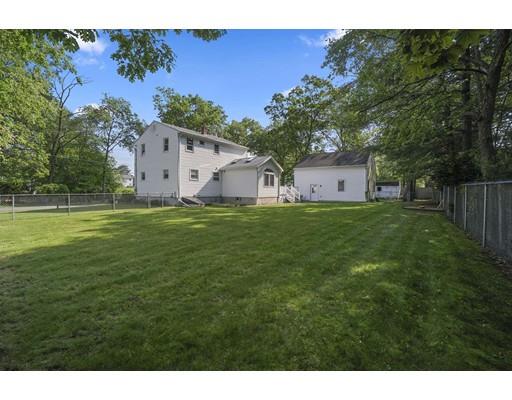 18 Community Road Billerica, MA 01821 - Photo 18 of 22 a house view with a garden space