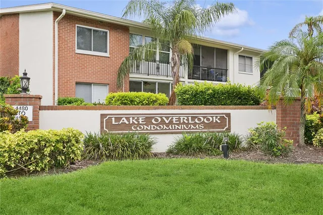 a street sign on the side of a building