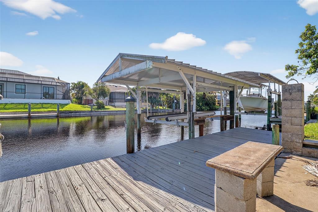 4210 Palm Drive Punta Gorda, FL 33950 - Photo 30 of 30 a view of a swimming pool with a patio