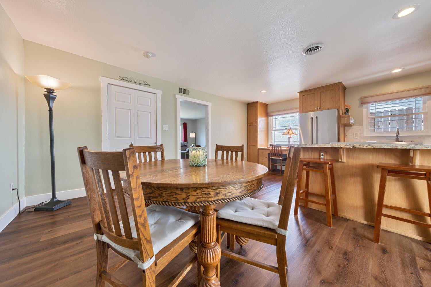 5422 Earnell Street Carmichael, CA 95608 - Photo 13 of 39 a dining room with furniture and wooden floor