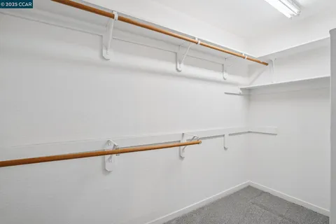 a view of a room with racks on the wall