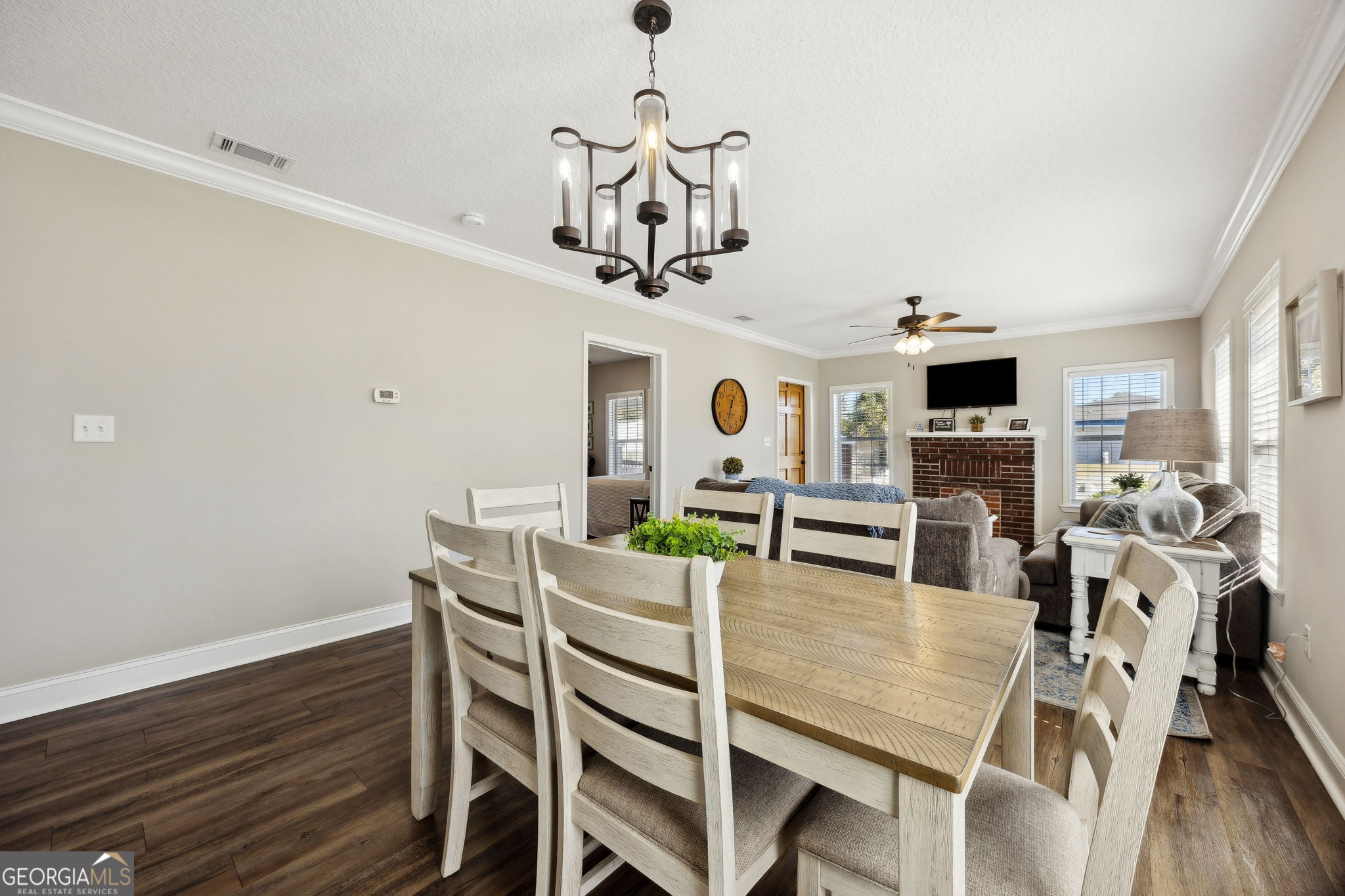 383 1st Street Folkston, GA 31537 - Photo 20 of 81 a view of a dining room with furniture and wooden floor