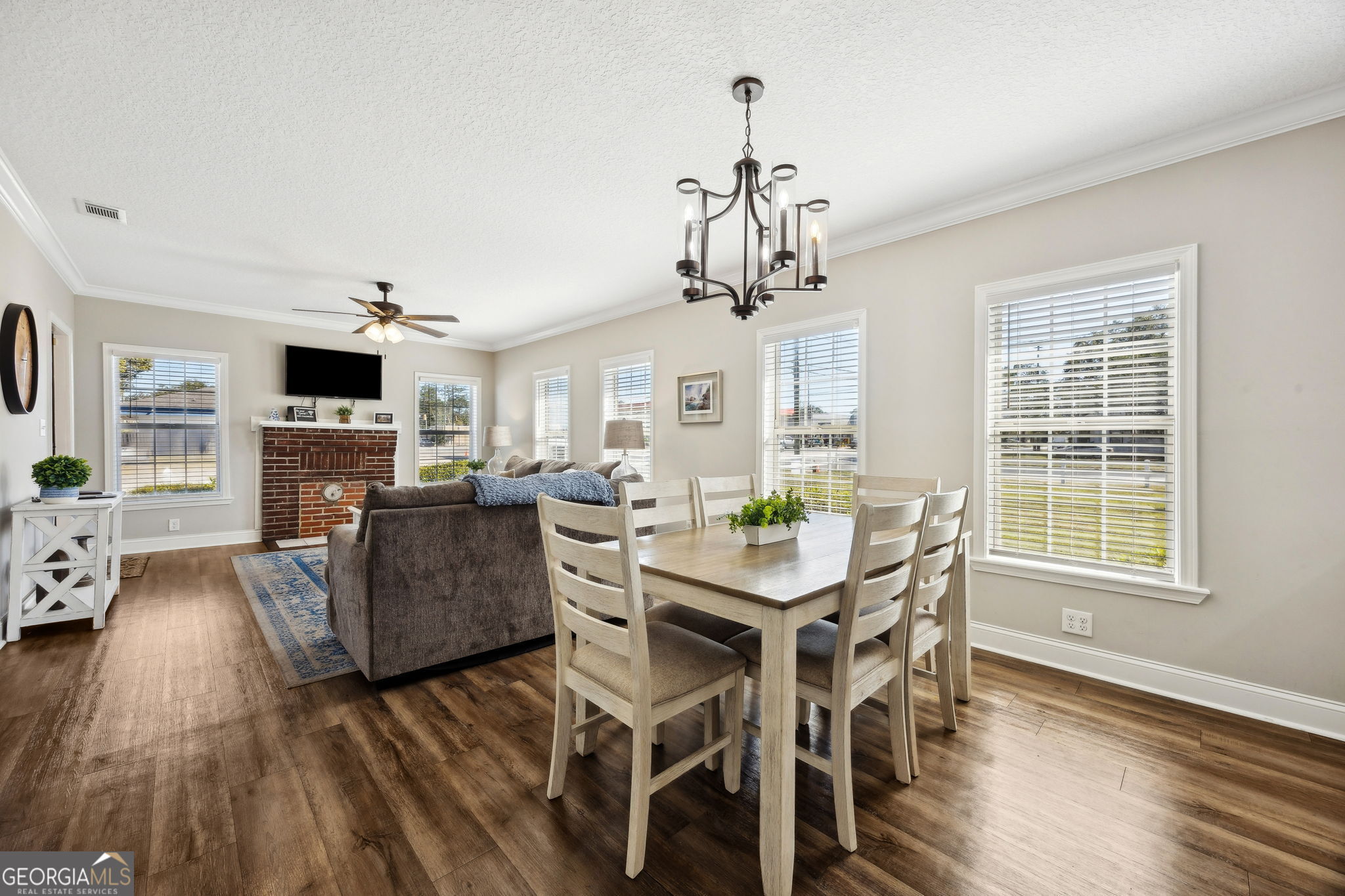 383 1st Street Folkston, GA 31537 - Photo 21 of 81 a view of a dining room with furniture window and wooden floor