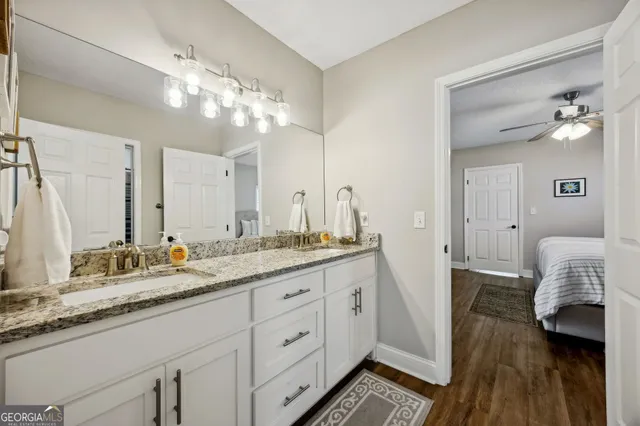 a table and chairs in front of a house