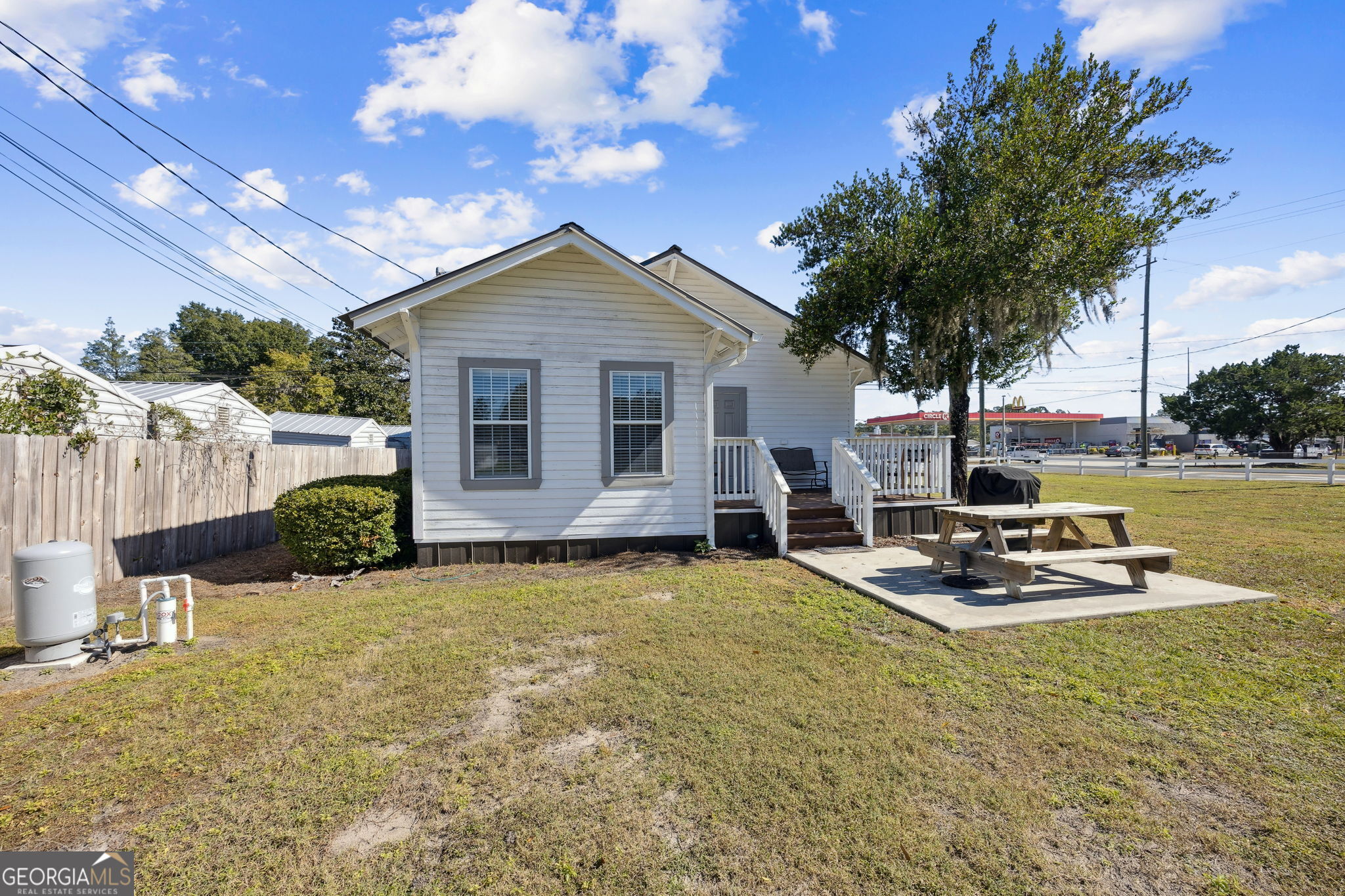 383 1st Street Folkston, GA 31537 - Photo 44 of 81 a view of a house with backyard and sitting area