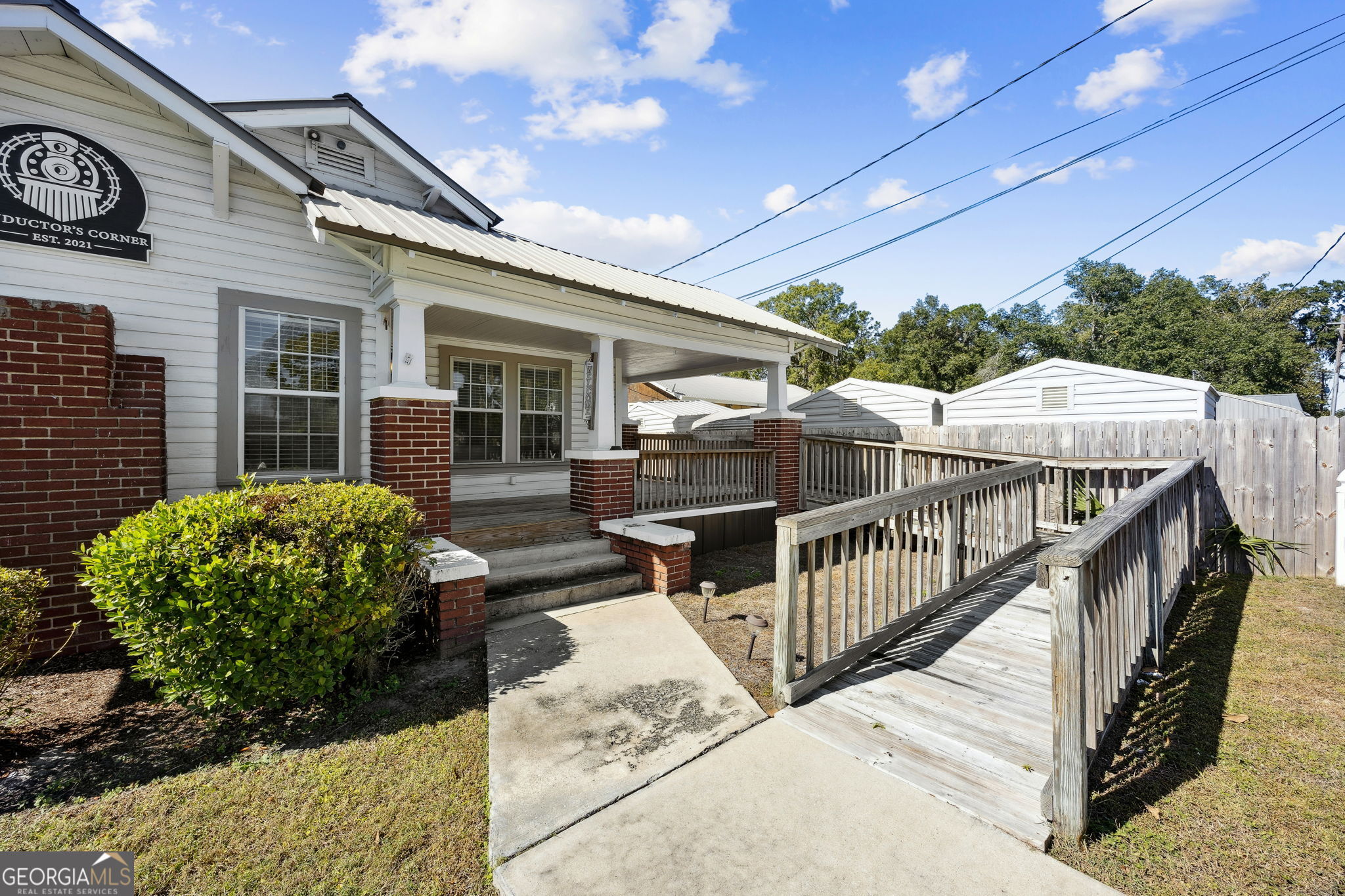 383 1st Street Folkston, GA 31537 - Photo 5 of 81 a view of a house with wooden deck