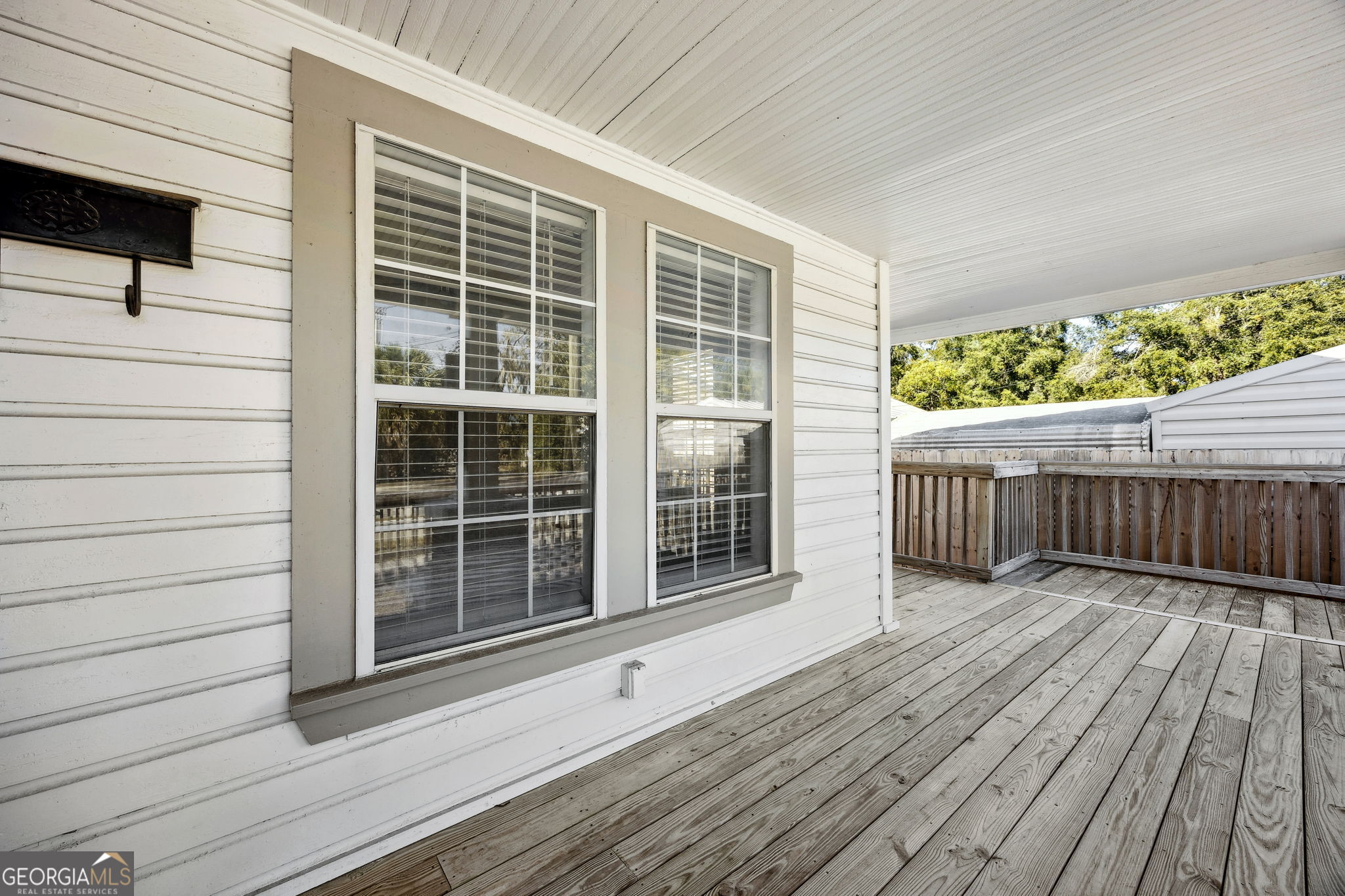 383 1st Street Folkston, GA 31537 - Photo 7 of 81 a view of backyard with deck and wooden floor