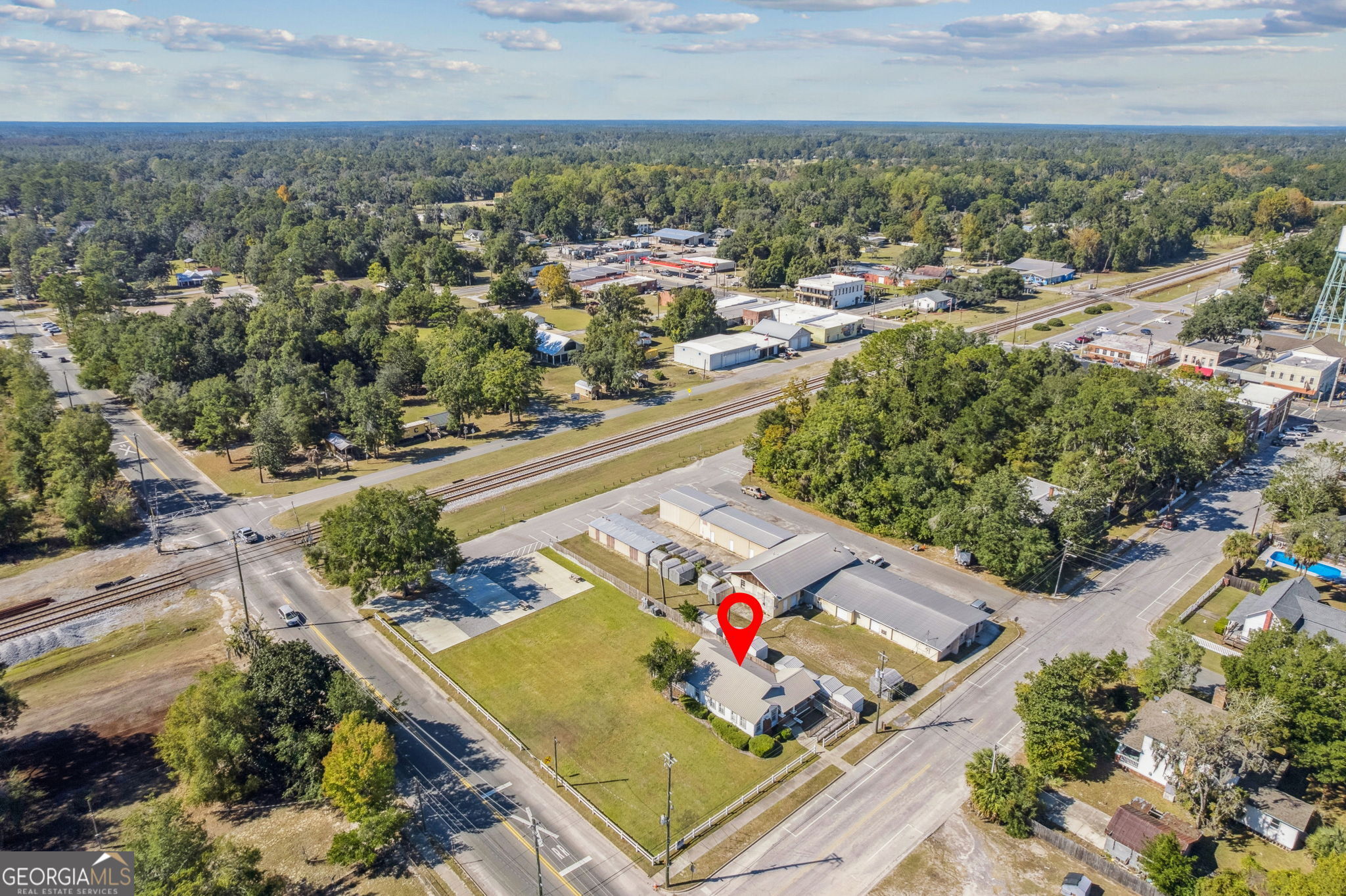 383 1st Street Folkston, GA 31537 - Photo 81 of 81 an aerial view of a residential houses with outdoor space