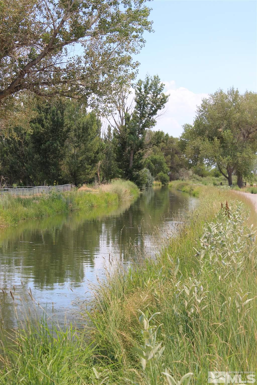 3425 Sorensen Road Fallon, NV 89406 - Photo 28 of 37 a view of a lake in between two trees