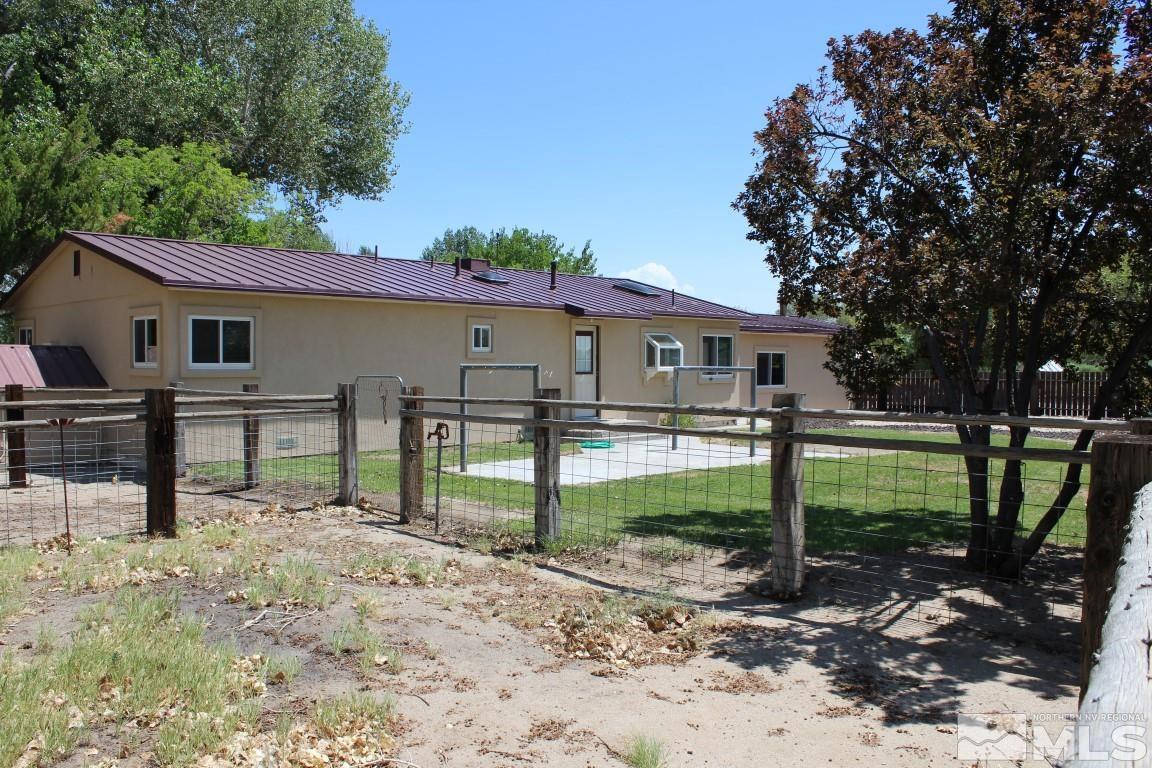 3425 Sorensen Road Fallon, NV 89406 - Photo 3 of 37 a view of a house with backyard and a tree