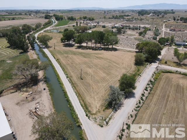 3425 Sorensen Road Fallon, NV 89406 - Photo 33 of 37 an aerial view of a house with a yard and lake view
