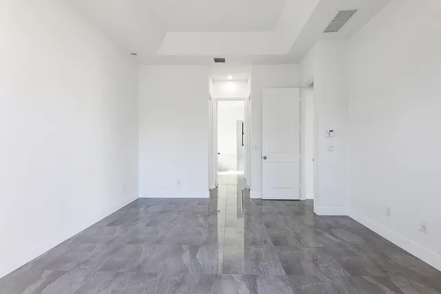 a bathroom with a bathtub and a sink