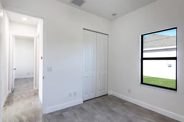 an empty room with windows