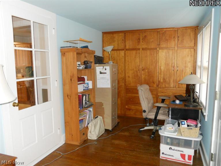 17540 Kinsman Road Middlefield, OH 44062 - Photo 8 of 16 1st floor office or spare BR with built-in closets and drawers, and hardwood floor.