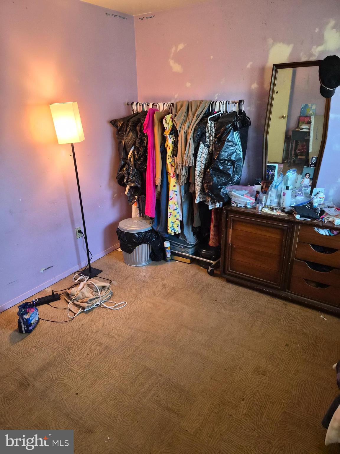 157 Edge Lane Willingboro, NJ 08046 - Photo 14 of 27 a view of walk in closet with clothes and shoes
