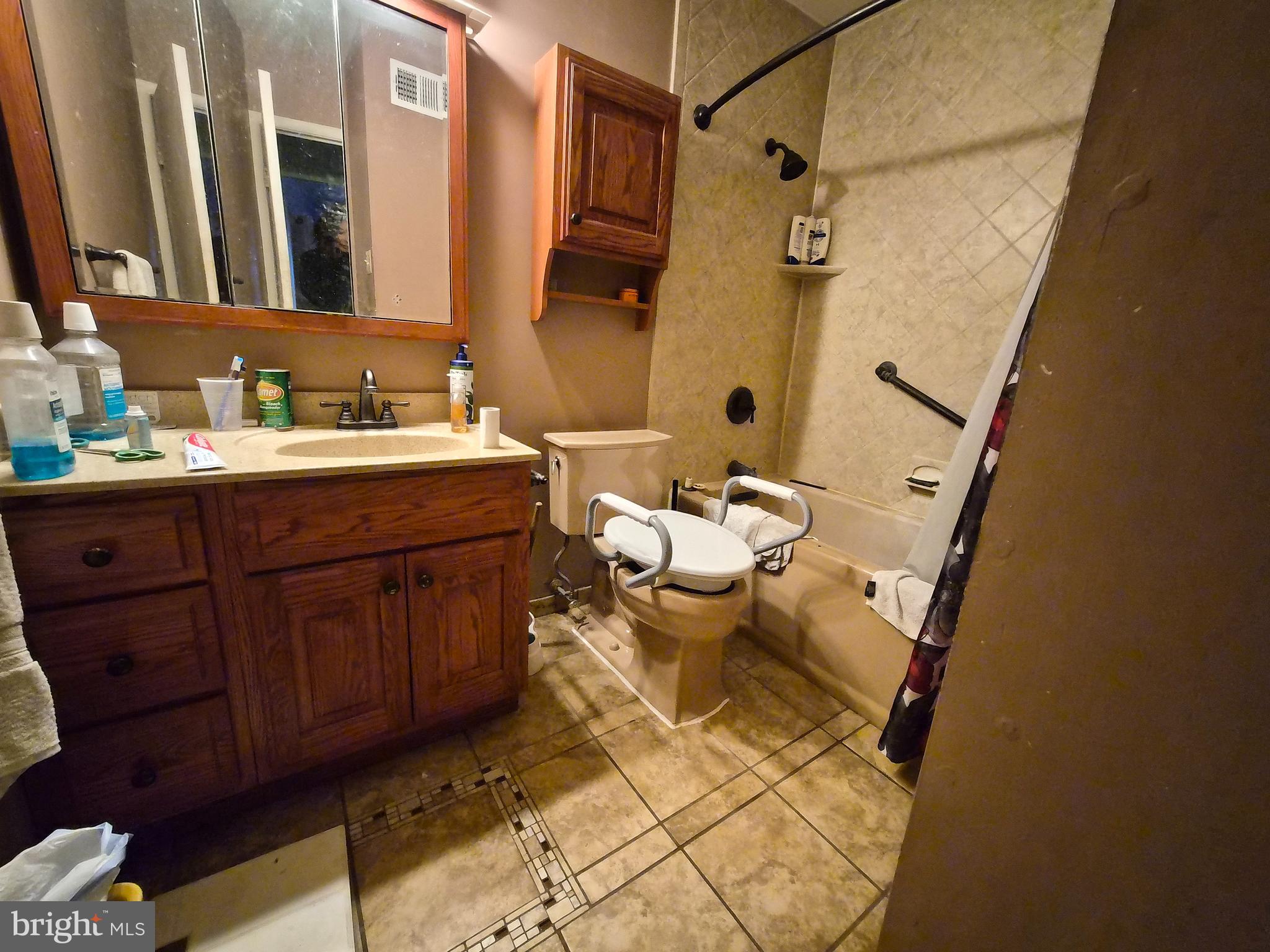 157 Edge Lane Willingboro, NJ 08046 - Photo 15 of 27 a bathroom with a granite countertop sink toilet and shower