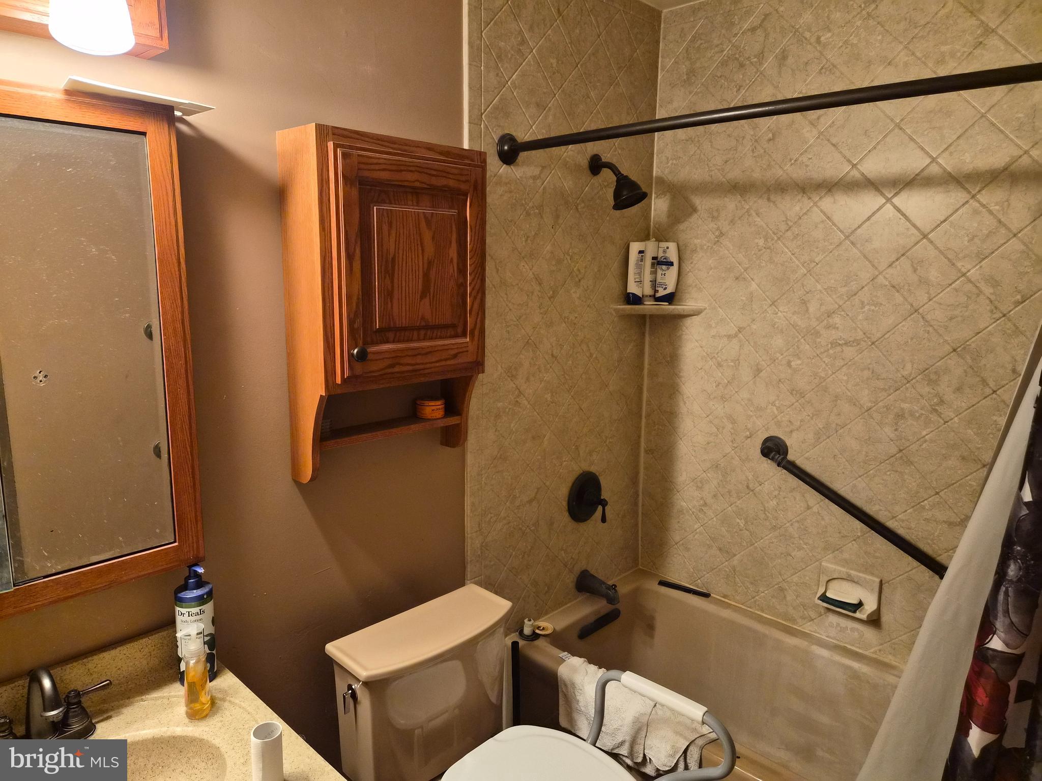 157 Edge Lane Willingboro, NJ 08046 - Photo 16 of 27 a bathroom with a toilet and a shower