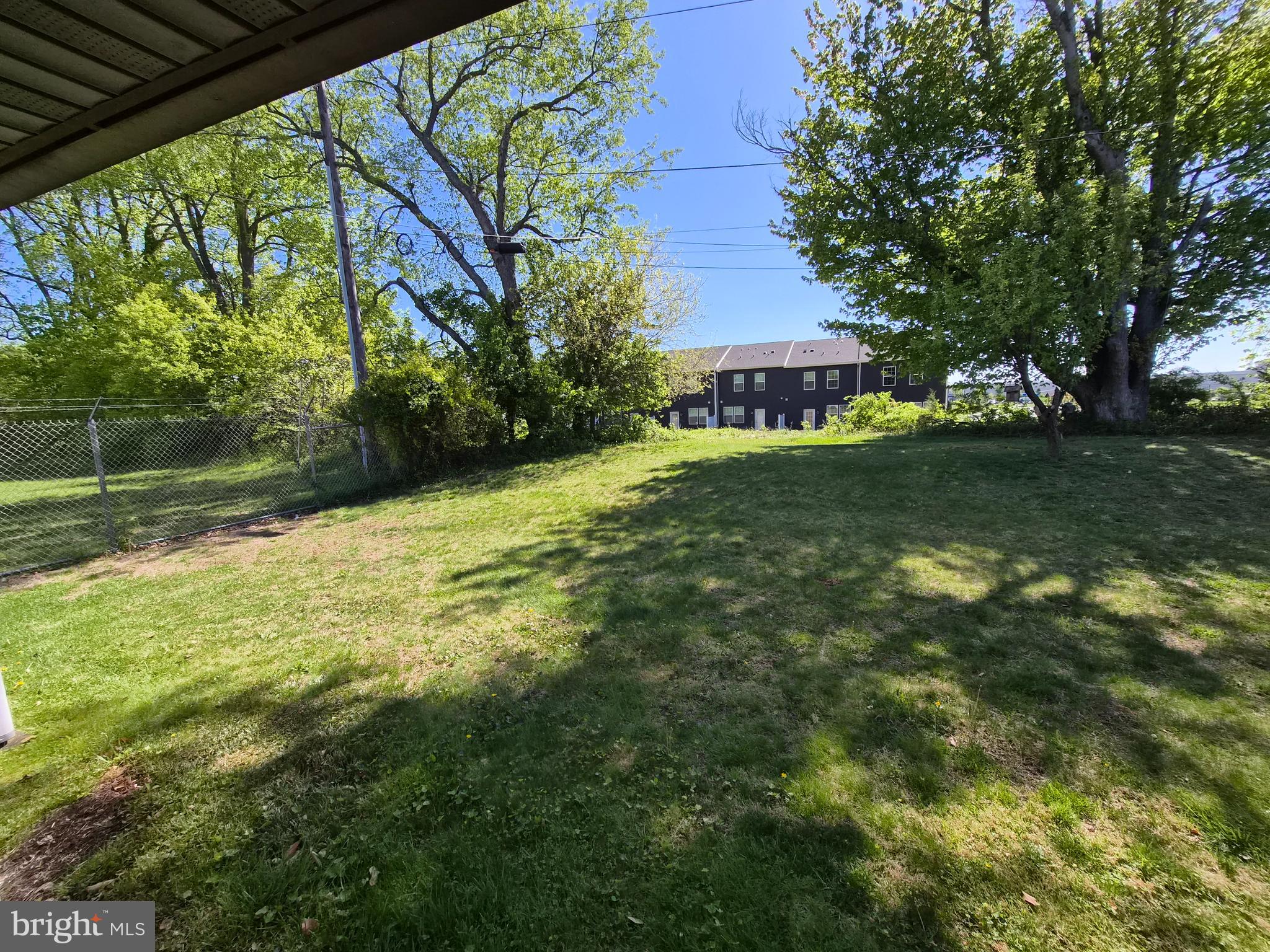157 Edge Lane Willingboro, NJ 08046 - Photo 23 of 27 a view of a house with a yard