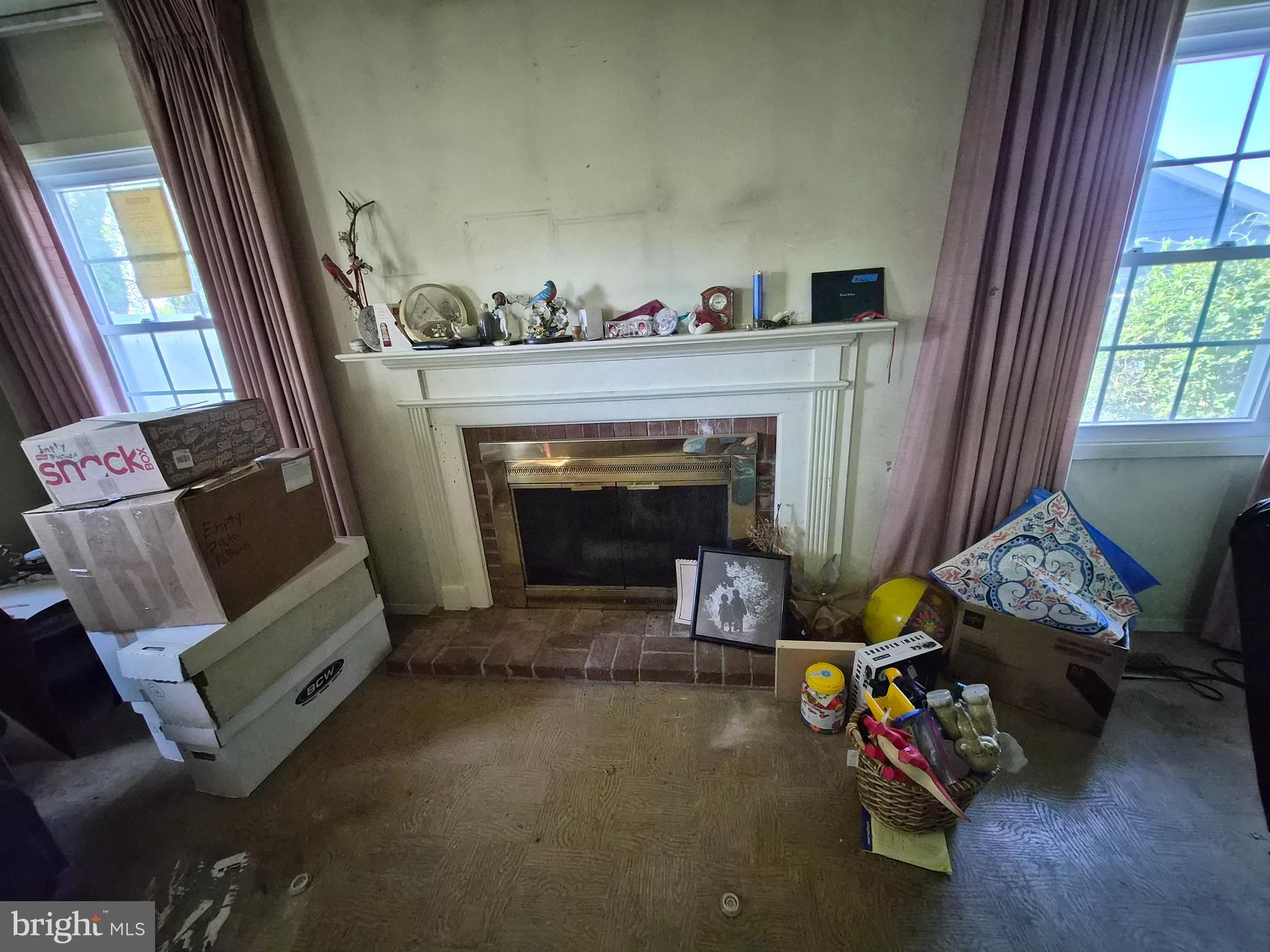 157 Edge Lane Willingboro, NJ 08046 - Photo 3 of 27 a living room with furniture and a fireplace