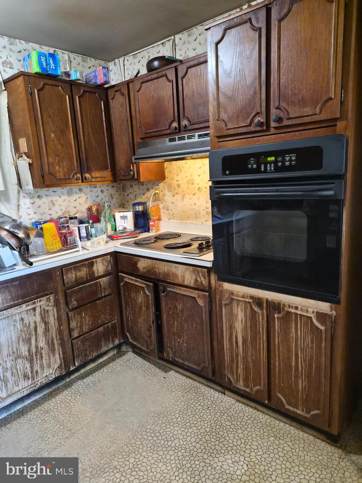 157 Edge Lane Willingboro, NJ 08046 - Photo 9 of 27 a kitchen with stainless steel appliances granite countertop a stove a sink and a microwave