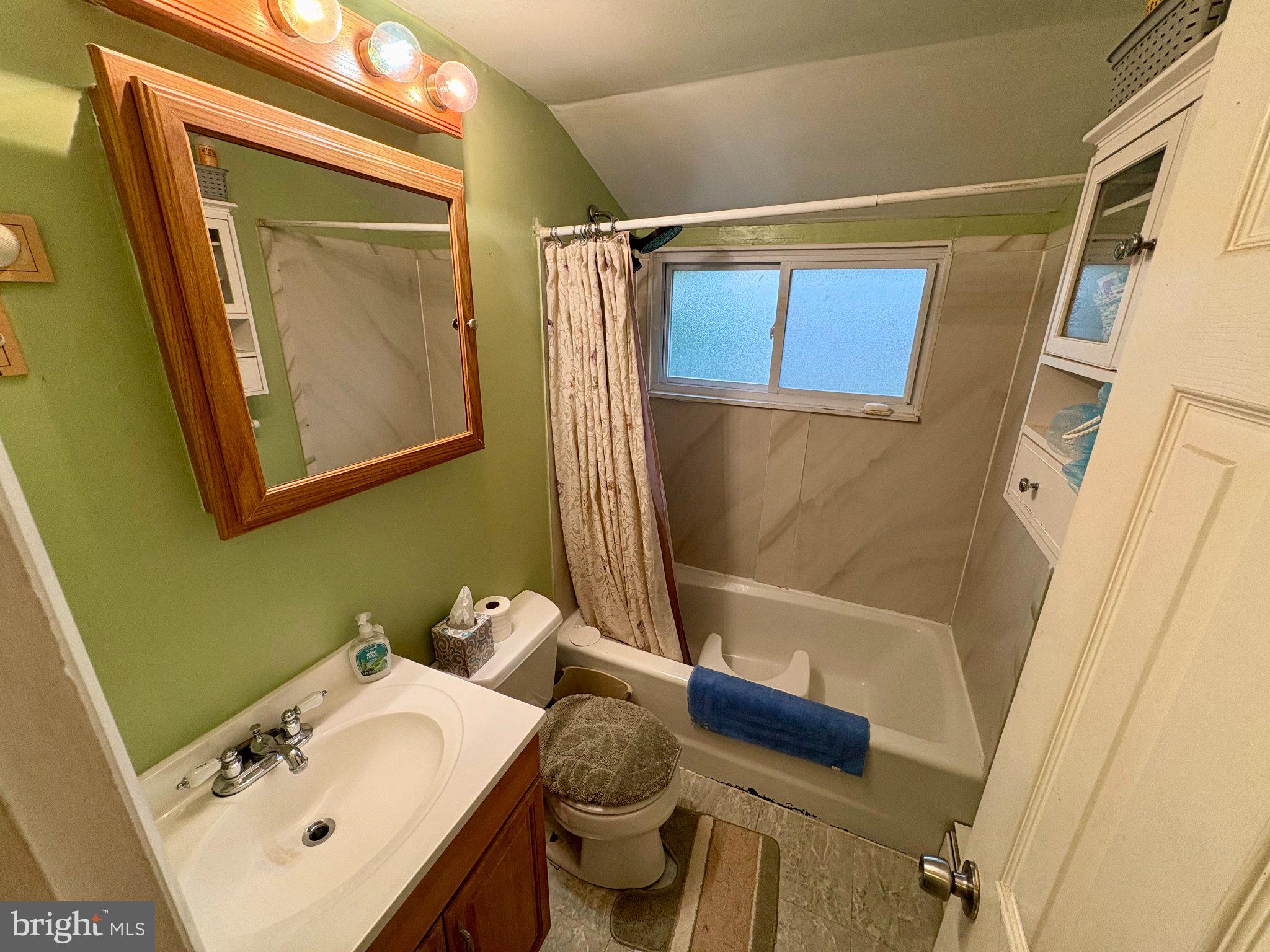 26 Plumtree Road Levittown, PA 19056 - Photo 14 of 16 Charming bathroom with modern touches.