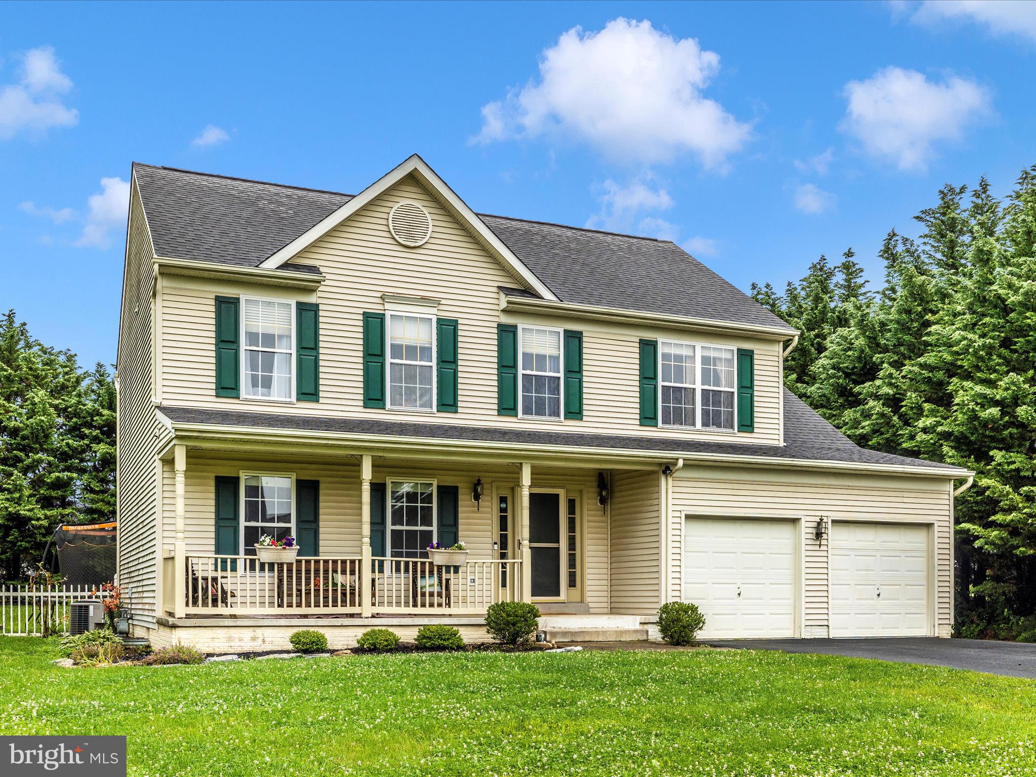 5880 Union Ridge Drive Adamstown, MD 21710 - Photo 1 of 49 a front view of a house with a yard