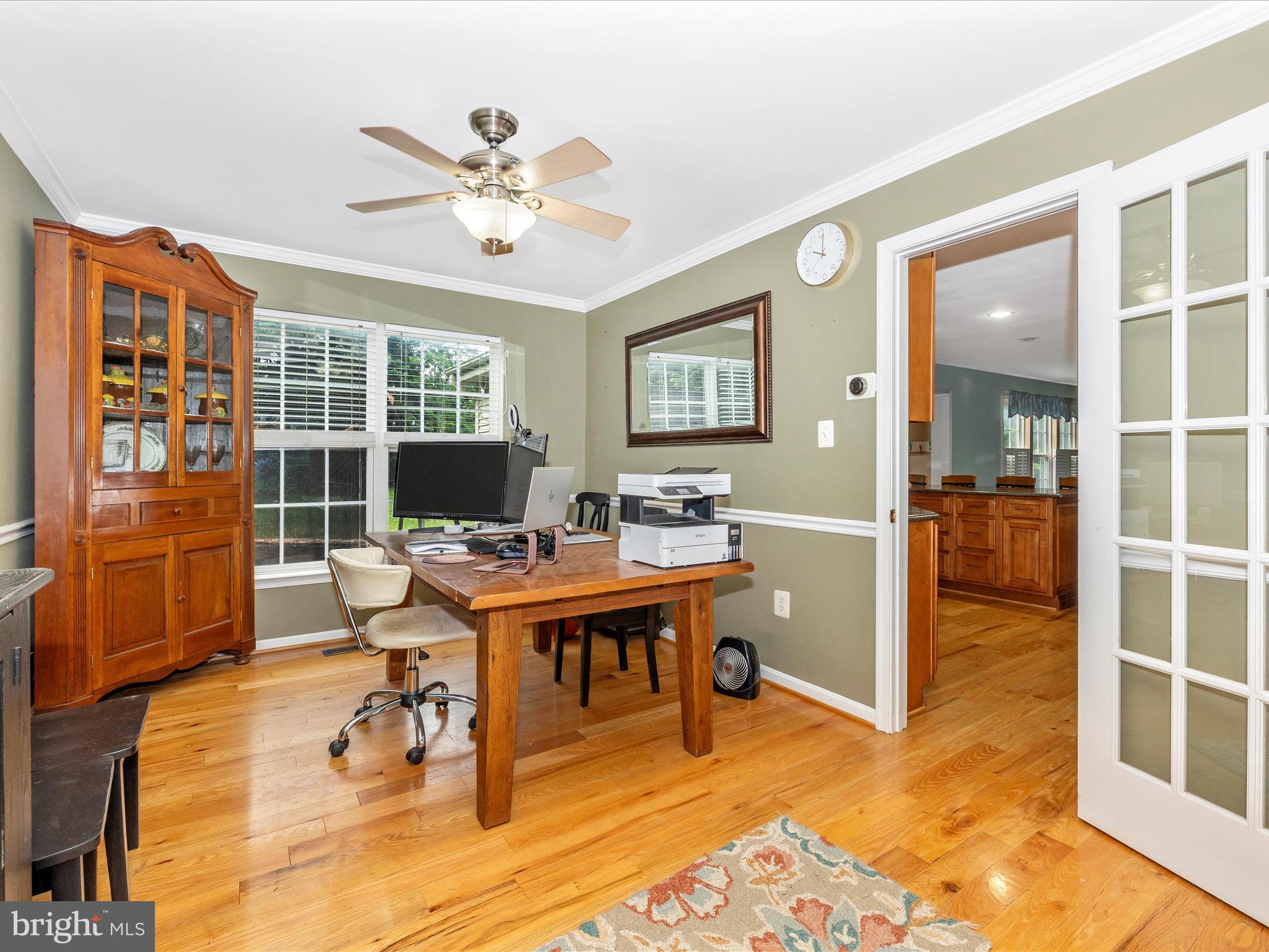 5880 Union Ridge Drive Adamstown, MD 21710 - Photo 13 of 49 a view of a workspace with furniture window and wooden floor