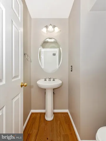 a bathroom with a sink and mirror