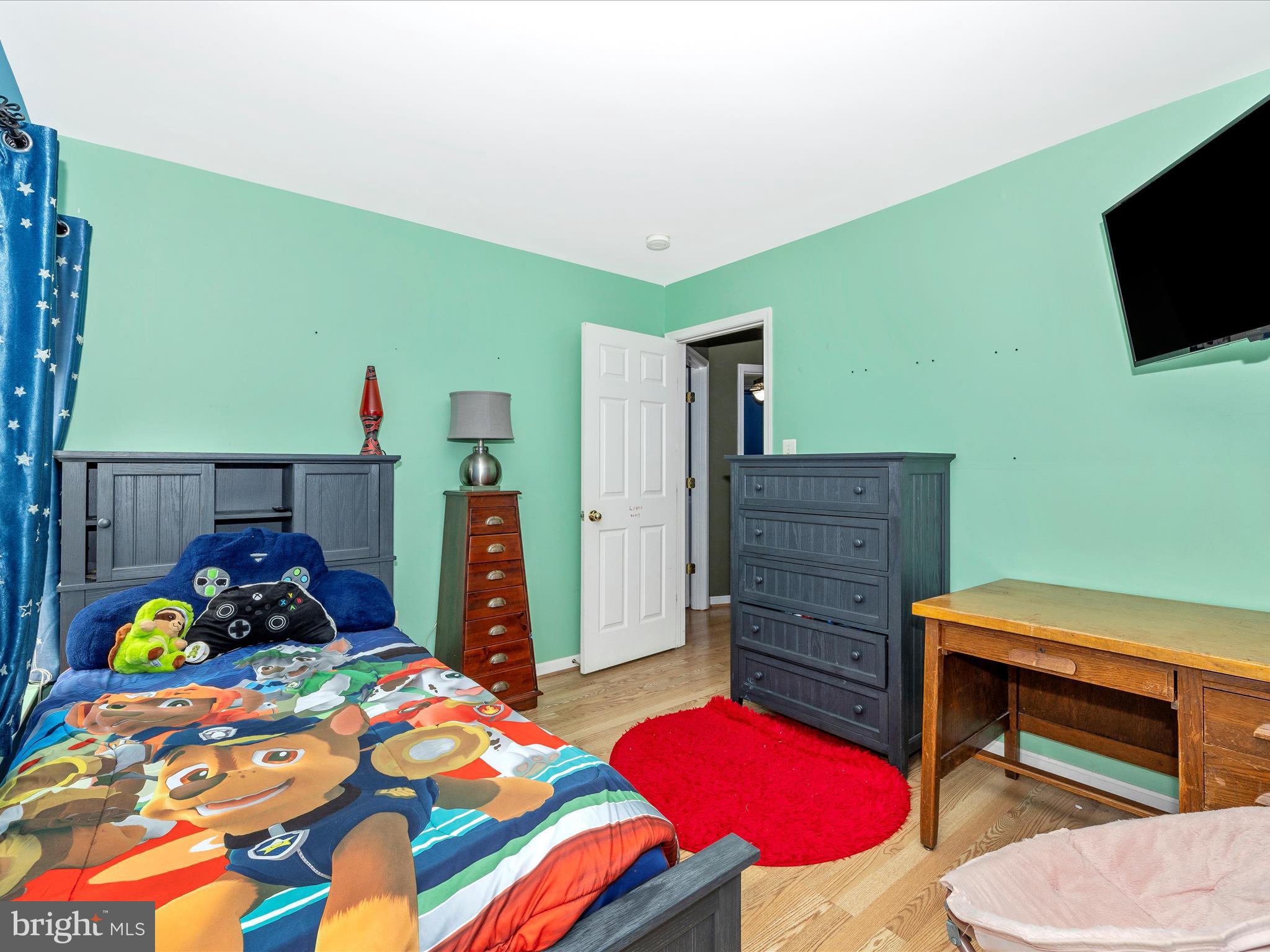 5880 Union Ridge Drive Adamstown, MD 21710 - Photo 34 of 49 a bedroom with a bed and a television