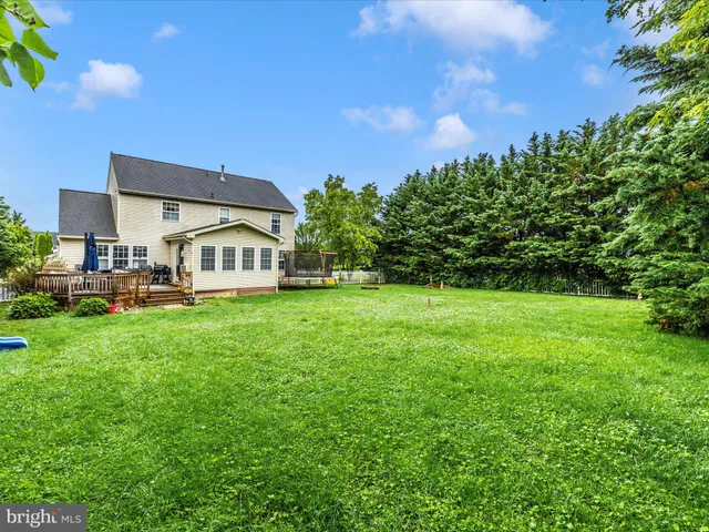 a view of a house with a big yard