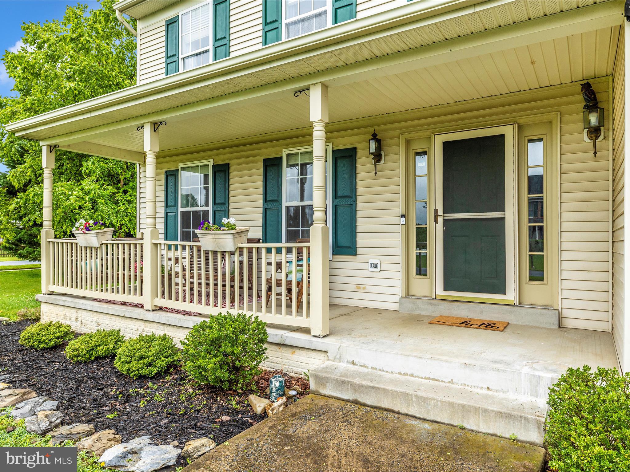 5880 Union Ridge Drive Adamstown, MD 21710 - Photo 5 of 49 a front view of a house with a porch