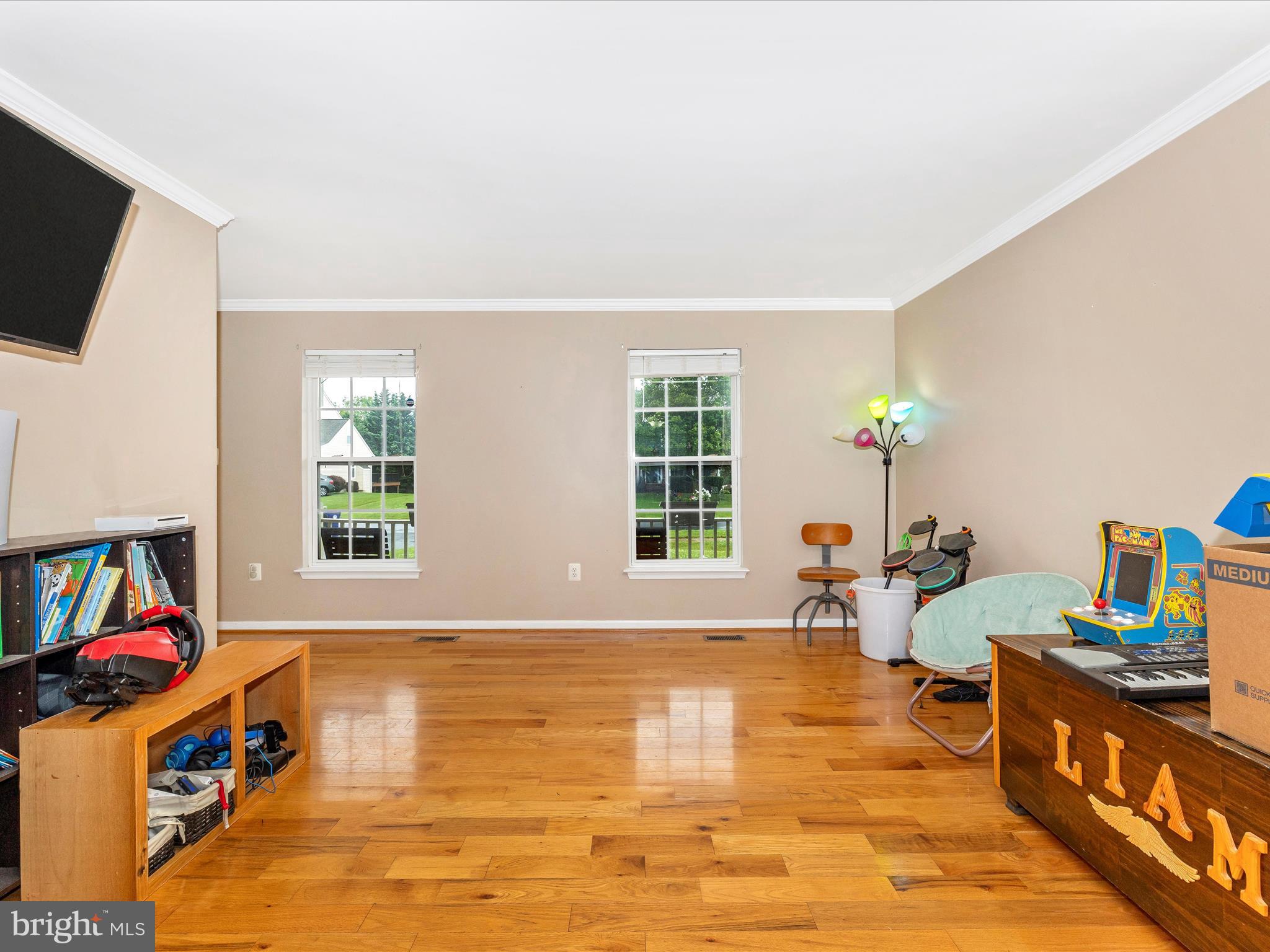 5880 Union Ridge Drive Adamstown, MD 21710 - Photo 9 of 49 a living room with furniture and a flat screen tv