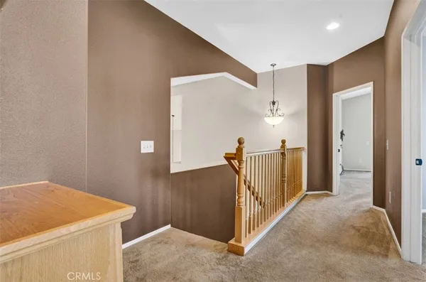a view of a hallway with entryway
