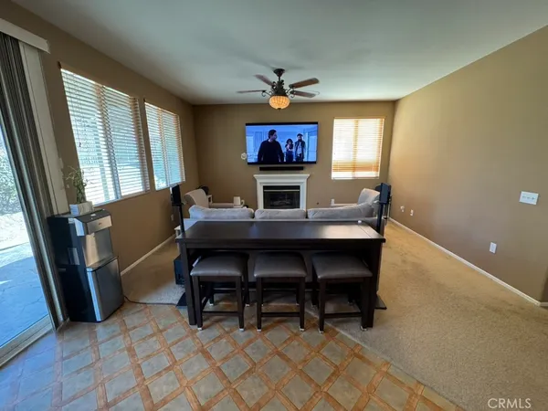 a workspace with furniture and window
