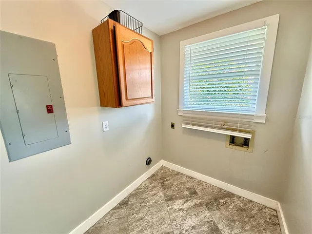 a view of a room with a window