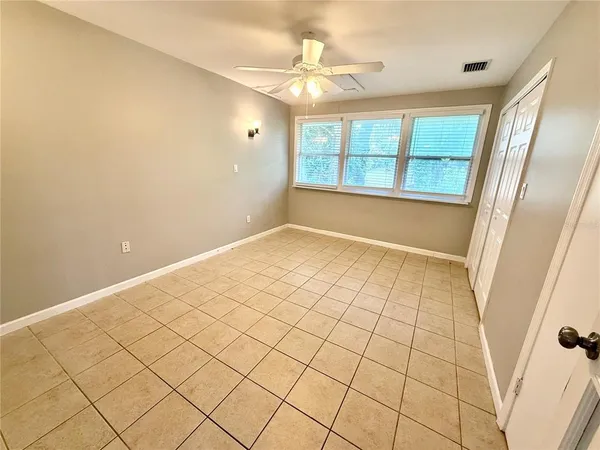 a view of an empty room and window
