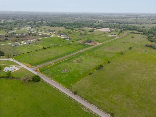 a view of a lake with a big yard
