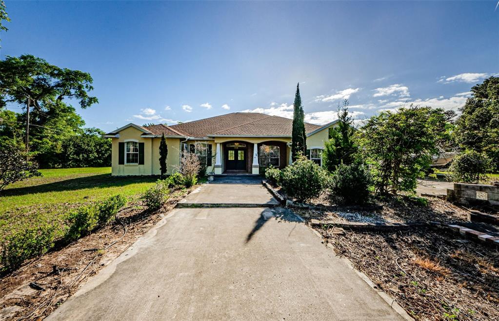16139 Sam C Road Brooksville, FL 34613 - Photo 1 of 1 Brooksville-FL-34613-Front View