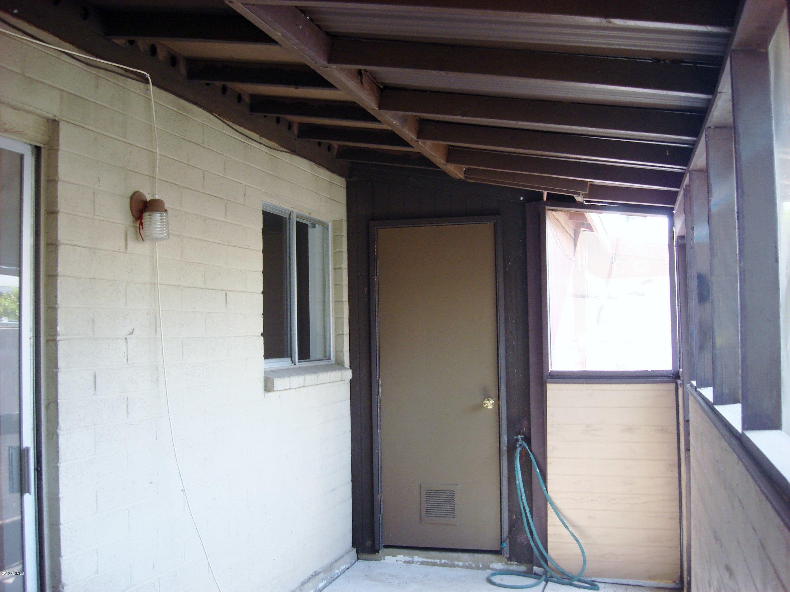 6733 North 16th Street, Unit 34 Phoenix, AZ 85016 - Photo 11 of 13 Back covered patio with storage
