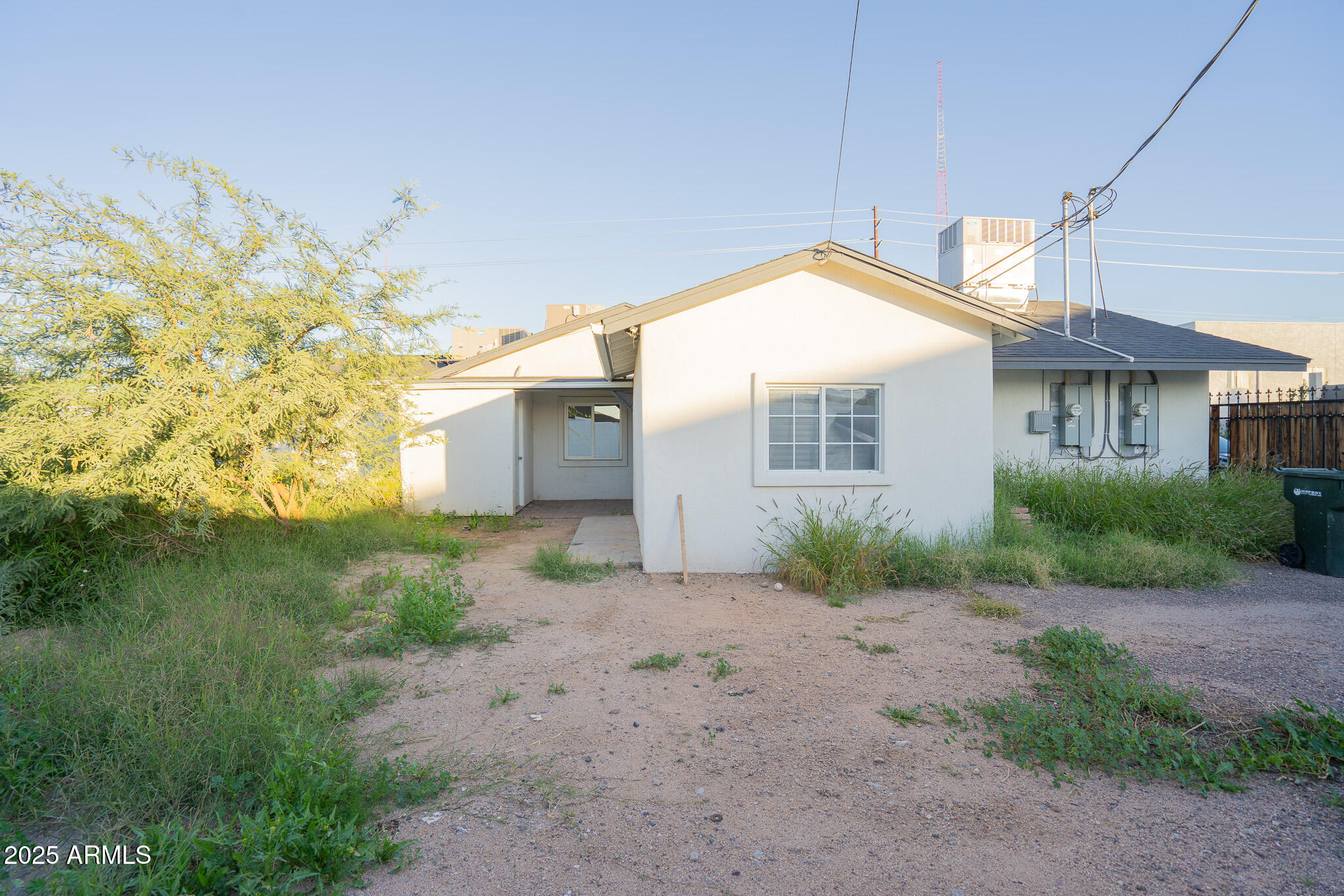 2802 North 36th Street, Unit 3 Phoenix, AZ 85008 - Photo 21 of 23 a view of a house with a backyard