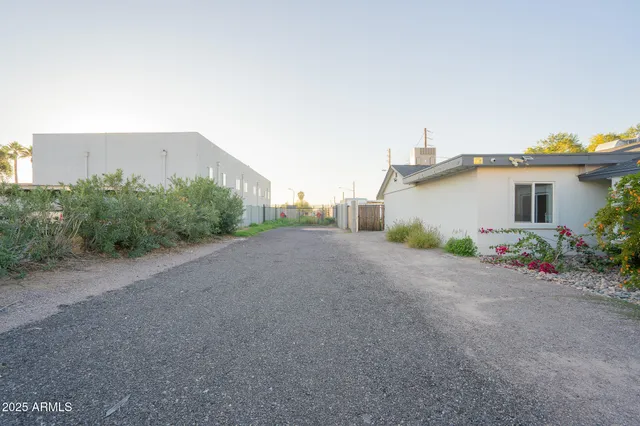 a view of a house with a street