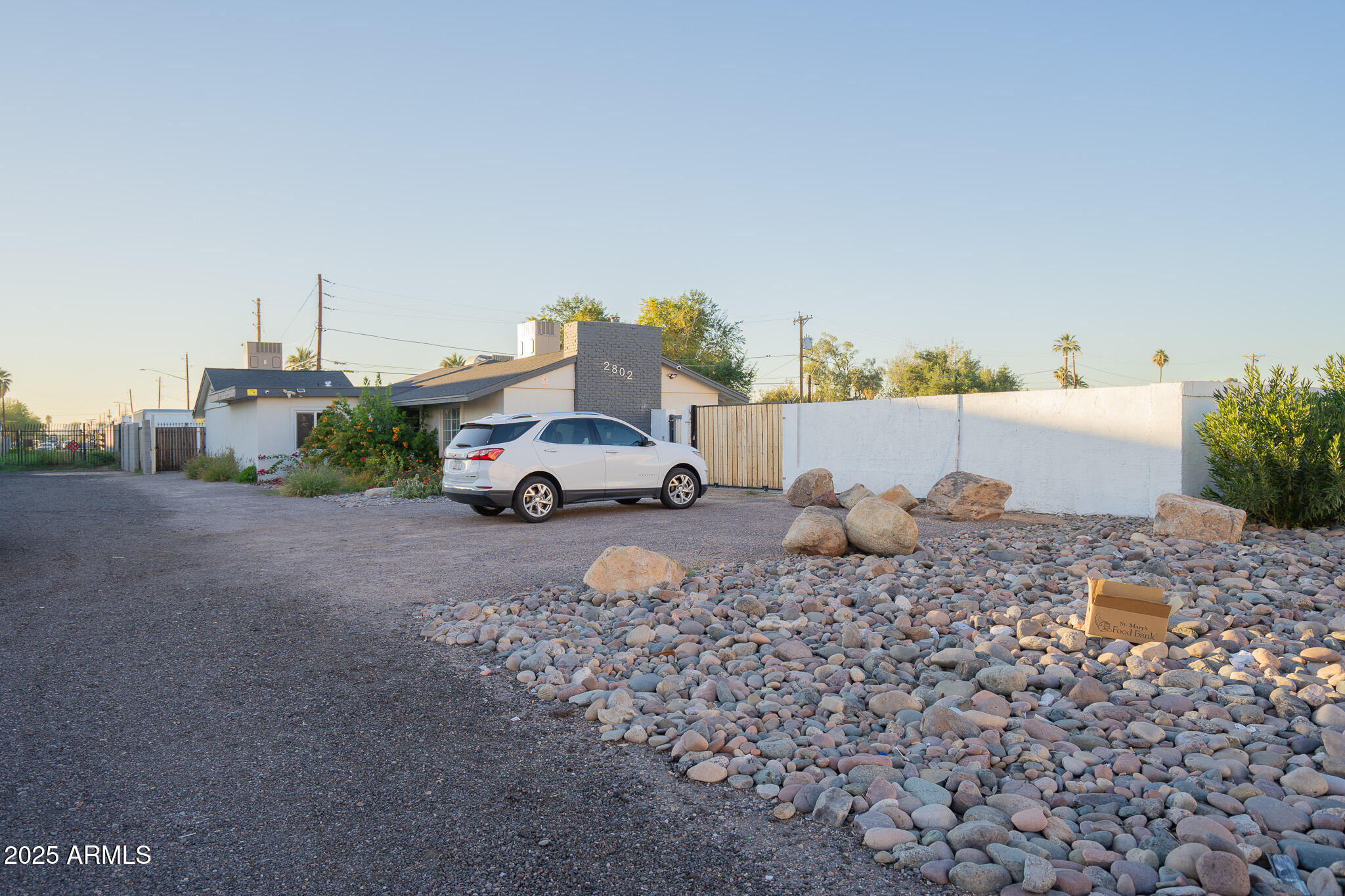 2802 North 36th Street, Unit 3 Phoenix, AZ 85008 - Photo 6 of 23 a car parked on the side of the road