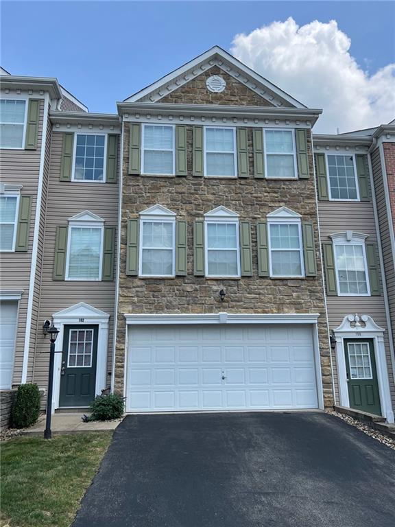 102 Alderwood Drive Greensburg, PA 15601 - Photo 2 of 12 a front view of a house with a yard