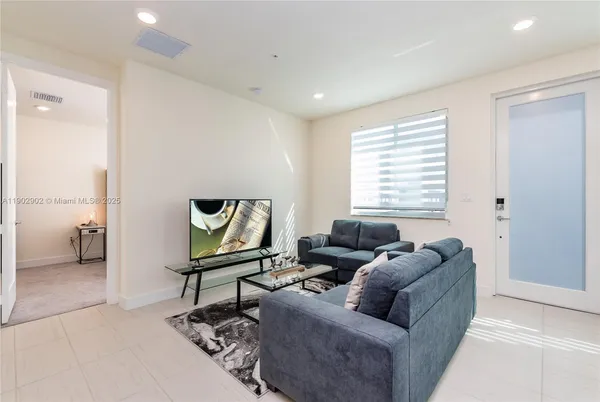 a view of a dining room with furniture