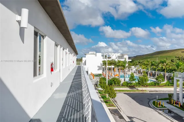 a en suite bathroom with double sink and a mirror