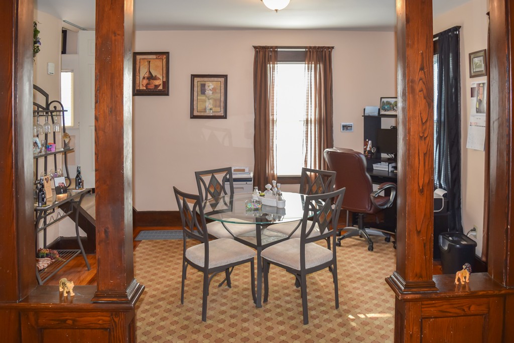 18 Claremont Street Springfield, MA 01108 - Photo 8 of 13 a dining room with furniture and wooden floor